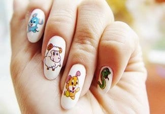 Рисунки животных на ногтях — картинка 1